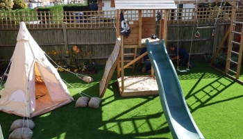 Milestone contributes landscaping supplies to garden for Woking toddler